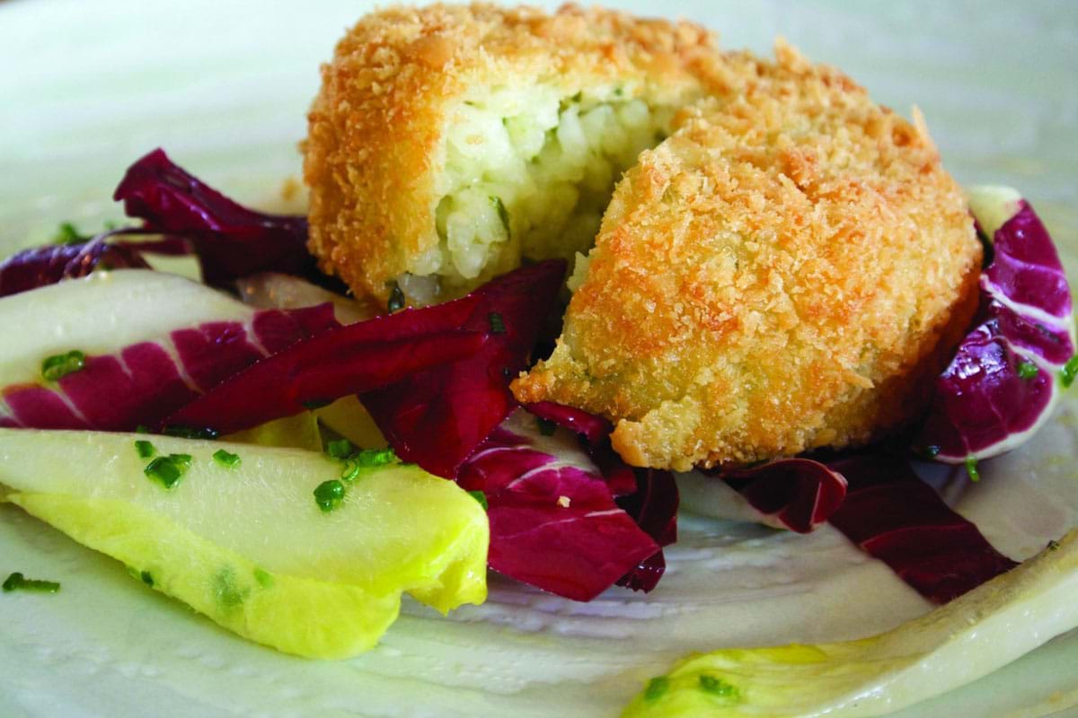 Colliers Cheese Breadcrumbed White Onion and Collier’s Cheddar Risotto Cake with a Radicchio and Chicory Salad and Honey